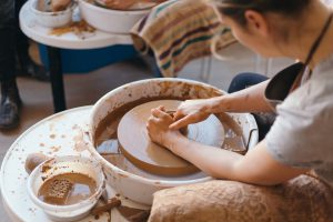 Ceramicist making pot